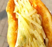Egg-filled pancake with shredded potatoes