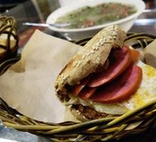 Braised flatbread with sausage