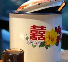 Plum Syrup in Large Ceramic Jar
