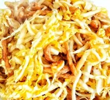 Shredded cabbage stir-fried with pork strips