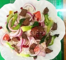 Onion Stir-Fry with Pork over Rice