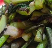 Preserved pork stir-fried with mustard greens